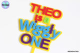 Custom Name is a Wiggly One Layered Cake Topper